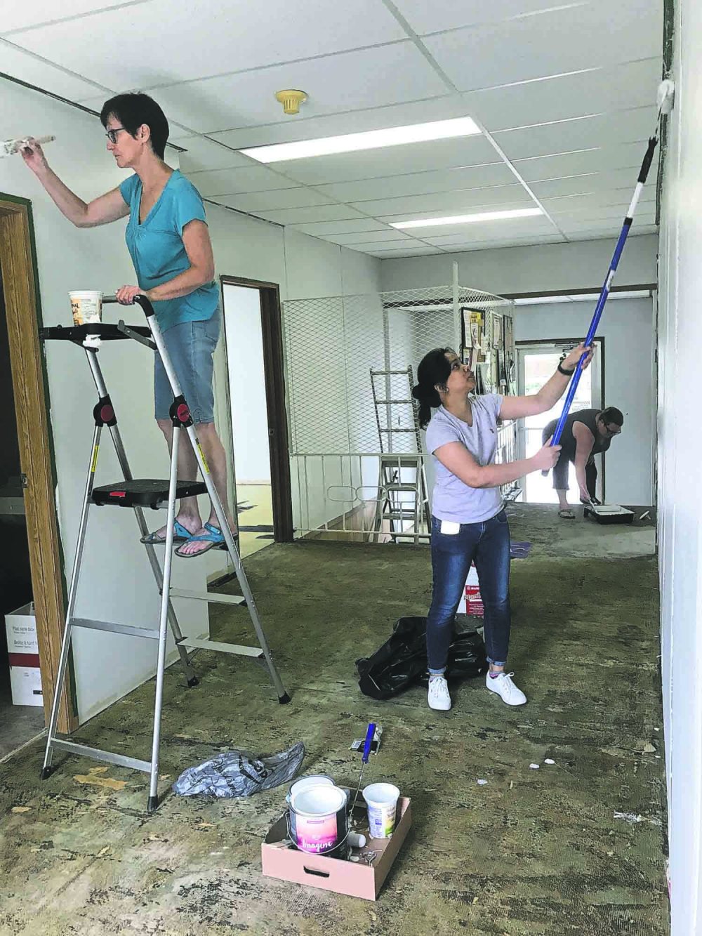 Submitted
Library clerks Bonnie Kroeker and Frances Arche lay down a fresh coat of paint at Killarney's Lakeland Regional Library back in early August.