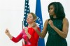 First lady Michelle Obama and Sophie Gr�goire-Trudeau, wife of Canadian Prime Minister Justin Trudeau, sing along with school children during a program at the U.S. Institute of Peace in Washington, Thursday, March 10, 2016, to highlight Let Girls Learn efforts and raise awareness for global girl's education. (AP Photo/Cliff Owen)