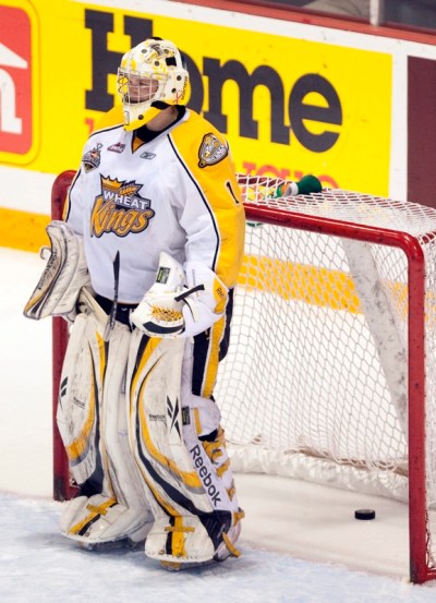 Frank Gunn / The Canadian Press
Brandon Wheat Kings goaltender Jacob De Serres stands in front of a goal during the Memorial Cup final game against the Windsor Spitfires. The Wheat Kings lost 9-1.