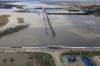 John Woods / Canadian Press
An aerial photo shows the Assiniboine River bearing down on 18th Street North and Kirkcaldy Drive in the Brandon flood zone. The river could peak as early as Monday.