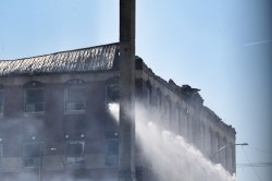 Matt Goerzen/The Brandon Sun
The Massey Manor building on Seventh Street required further efforts from Brandon firefighters on Sunday morning, as crews continued to address smoke emanating from the structure.