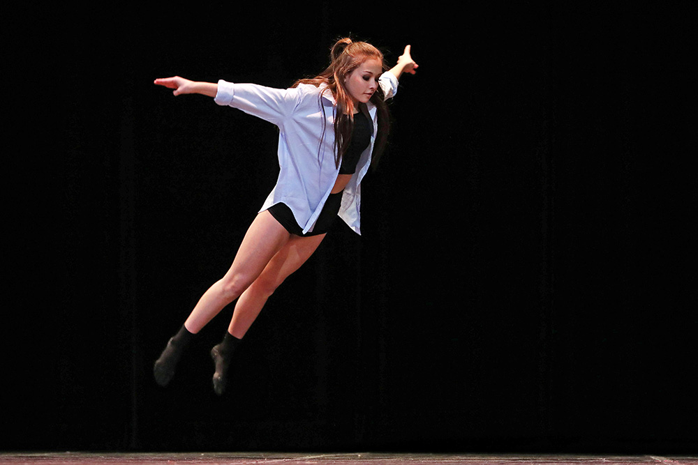 Georgia Keller leaps during her performance in the Dance, Self-choreography Solo, Own Choice, 14 Years & Under category during the Dance portion of the Brandon Festival of the Arts at the Western Manitoba Centennial Auditorium on Wednesday. 
(Tim Smith/The Brandon Sun)