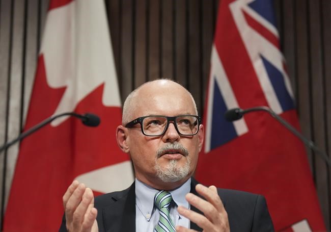 Dr. Kieran Moore, Ontario's Chief Medical Officer of Health speaks at a press conference during the COVID-19 pandemic, at Queen’s Park in Toronto on Monday, April 11, 2022. Ontario's top doctor says he and other health officials are planning for a new round of COVID-19 booster doses to be rolled out this fall. THE CANADIAN PRESS/Nathan Denette