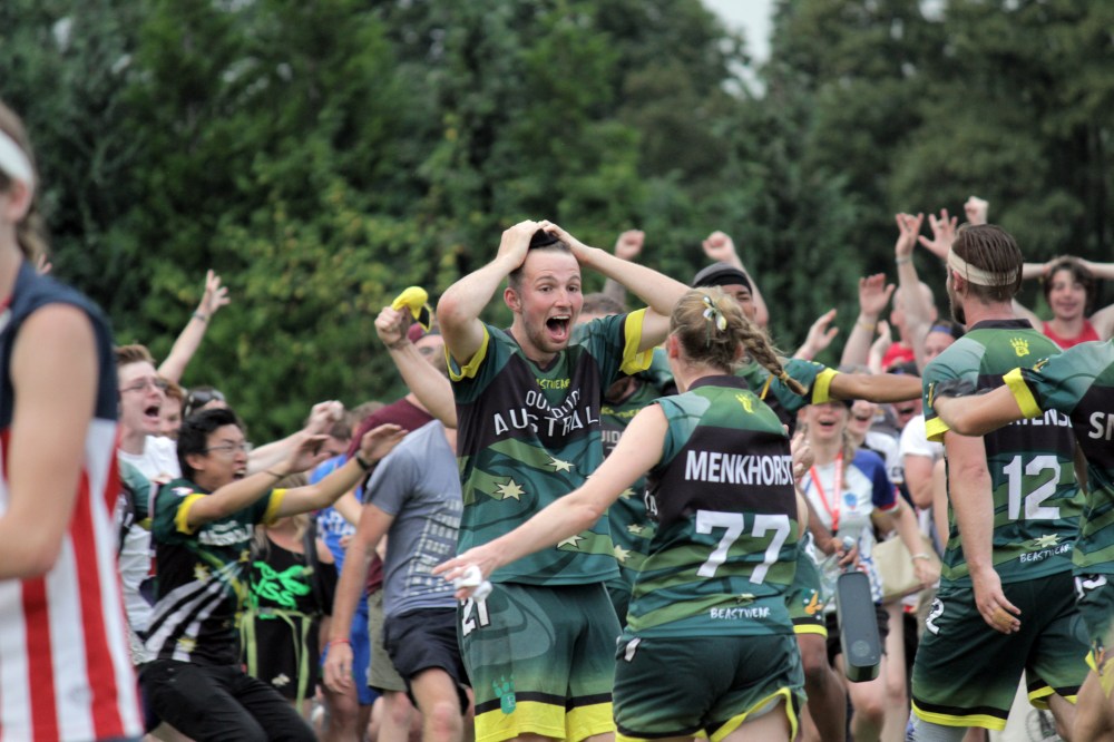 Andrew Nguyen
Luke Derrick (centre) holds his hands on top of his head after Team Australia catches the snitch to defeat Team USA during the finals.