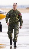 Brigadier General Trevor Cadieu looks on as the Grey Cup arrives at CFB Edmonton on Tuesday, Nov. 20, 2018. THE CANADIAN PRESS/Jonathan Hayward