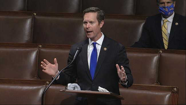 FILE - In this image from video, Rep. Rodney Davis, R-Ill., speaks on the floor of the House of Representatives at the U.S. Capitol in Washington, April 23, 2020. (House Television via AP)