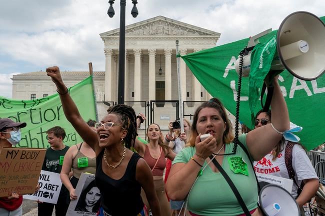 Abortion-rights protesters regroup and protest following Supreme Court's decision to overturn Roe v. Wade, federally protected right to abortion, in Washington, Friday, June 24, 2022. THE CANADIAN PRESS/AP-Gemunu Amarasinghe