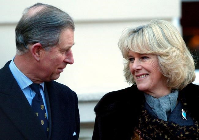FILE - Prince Charles, the Prince of Wales, and his wife-to-be, Camilla Parker Bowles, in the garden of Clarence House, London, Monday, Feb.21, 2005. Camilla, the Duchess of Cornwall, will celebrate her 75th birthday on Sunday, July 17, 2022 marking the occasion with a small family dinner at Prince Charles’ Highgrove estate in southwest England. (Stephen Hird/Pool photo via AP, file)