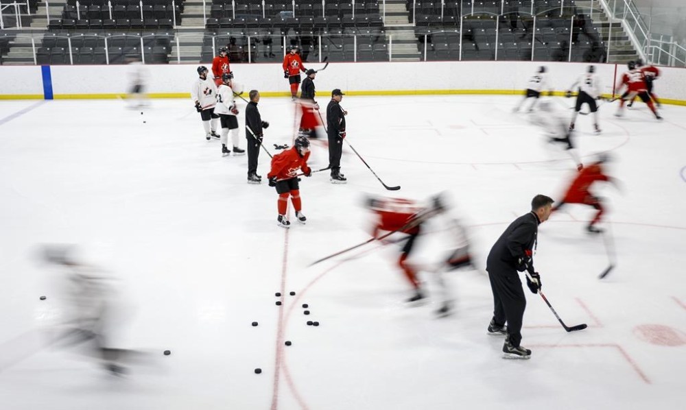 Canada’s national junior team players skate during a training camp practice in Calgary, Tuesday, Aug. 2, 2022.THE CANADIAN PRESS/Jeff McIntosh