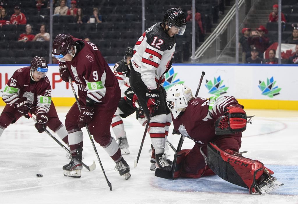 Bedard shines, host Canada downs Latvia 52 at world junior hockey