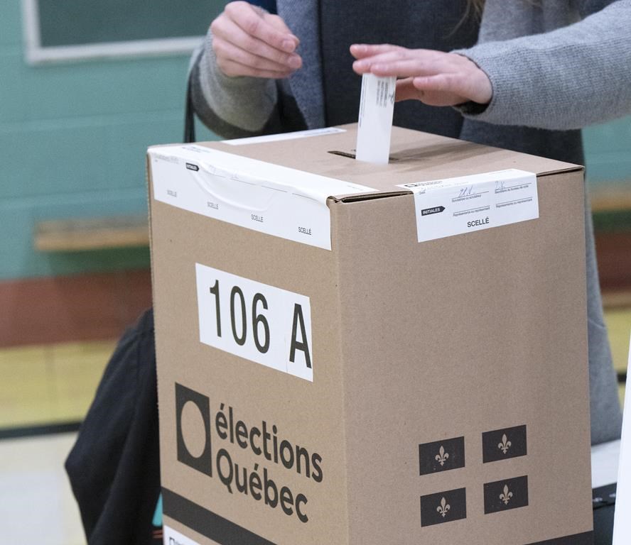 A voter casts their ballot in the Quebec provincial election in Montreal, Monday, Oct. 3, 2022. THE CANADIAN PRESS/Ryan Remiorz