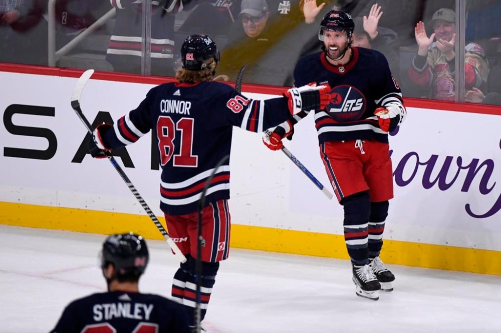 Winnipeg Jets' Sam Gagner (right) celebrates his goal against the St. Louis Blues with teammate Kyle Connor during the third period of NHL action in Winnipeg on Monday, October 24, 2022. NHL players choosing their own goal songs is trending in a sport that's historically emphasized team and downplayed the individual. THE CANADIAN PRESS/Fred Greenslade