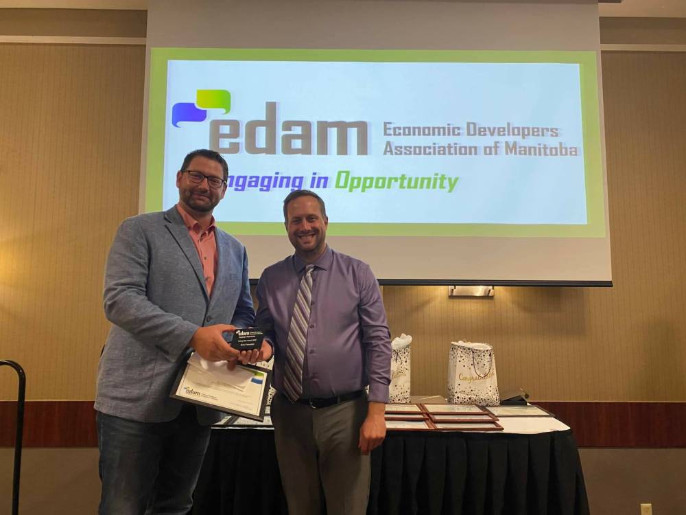 Melita-based economic development officer Eric Forster (left) accepts his Rising Star Award from Tyler King, chairperson of the Economic Developers Association of Manitoba. EDAM held its Fifth Annual Manitoba Economic Development Awards in Winnipeg on Sept. 22.