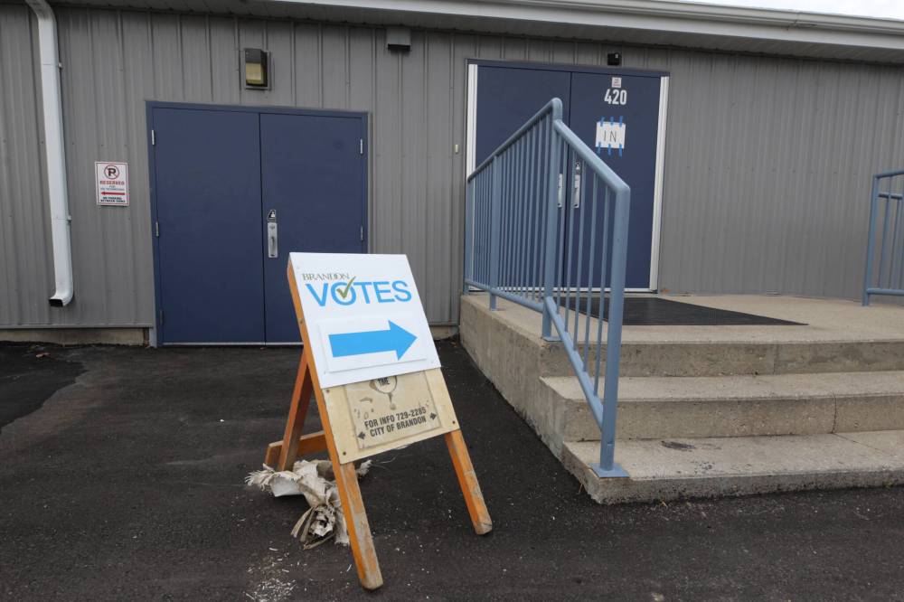 The Riverview Curling Club polling station in wards 8 and 10 sports a Brandon Votes sign outside of the front door on Wednesday afternoon. (Matt Goerzen/The Brandon Sun)