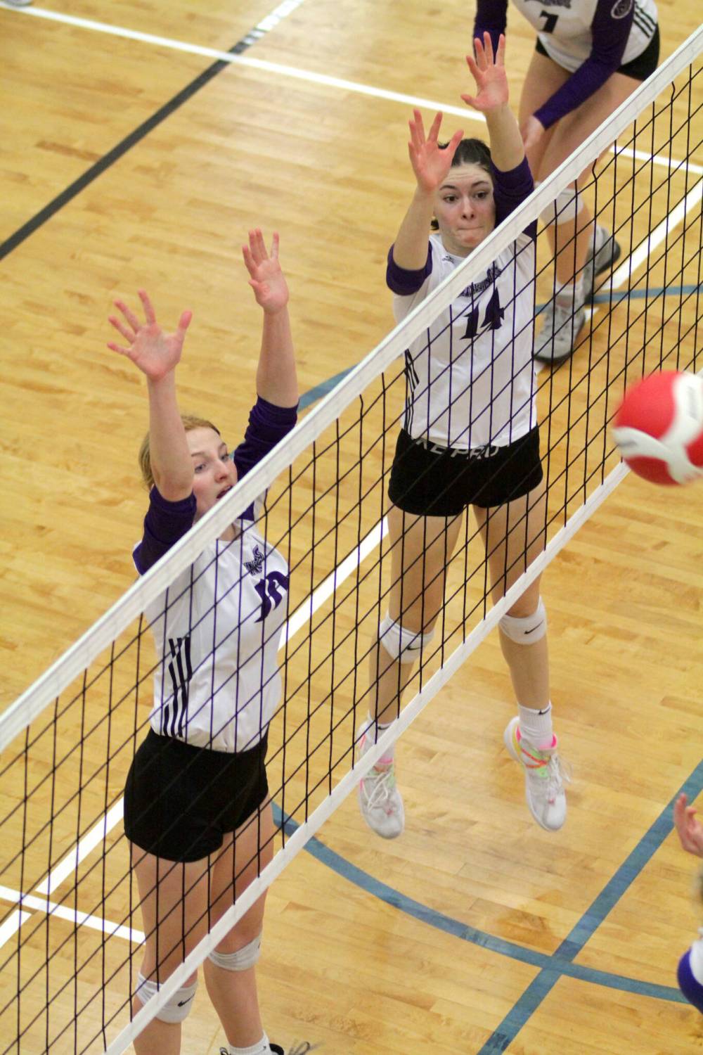 Ava Plamondon, left, Tiana Low and the Vincent Massey Vikings captured the St. Vital Invitational varsity girls volleyball tournament title last weekend. (Thomas Friesen/The Brandon Sun)
