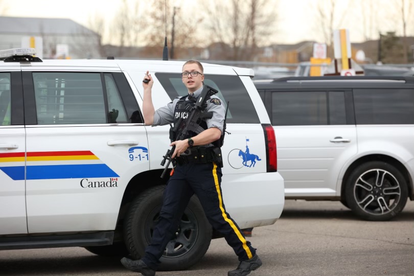 Brandon police are seen outside Crocus Plains Regional Secondary School Tuesday morning. (Tim Smith/The Brandon Sun)