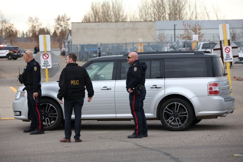 Brandon police are seen outside Crocus Plains Regional Secondary School Tuesday morning. (Tim Smith/The Brandon Sun)