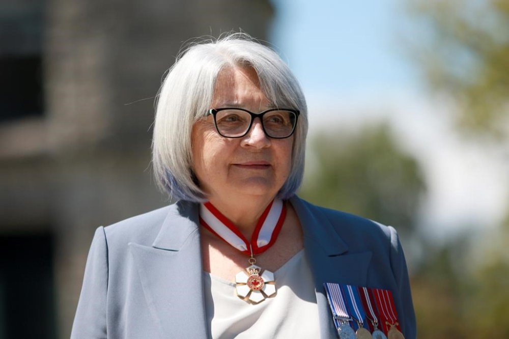 Gov. Gen. Mary May Simon inspects members of the Guard of Honour at the legislature in Victoria, Friday, May 20, 2022. THE CANADIAN PRESS/Chad Hipolito