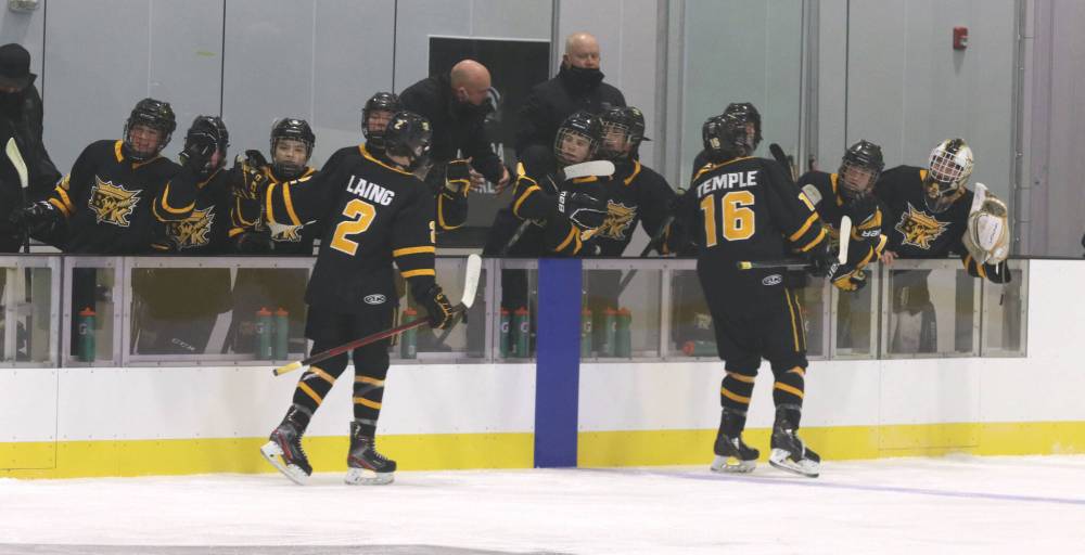 If there's one thing the U15 AAA Brandon Wheat Kings had lots of opportunity to practise last season, it was the fly-by at the bench after they scored. Head coaches Dave Lewis and Craig Anderson are in the background. (Perry Bergson/The Brandon Sun)