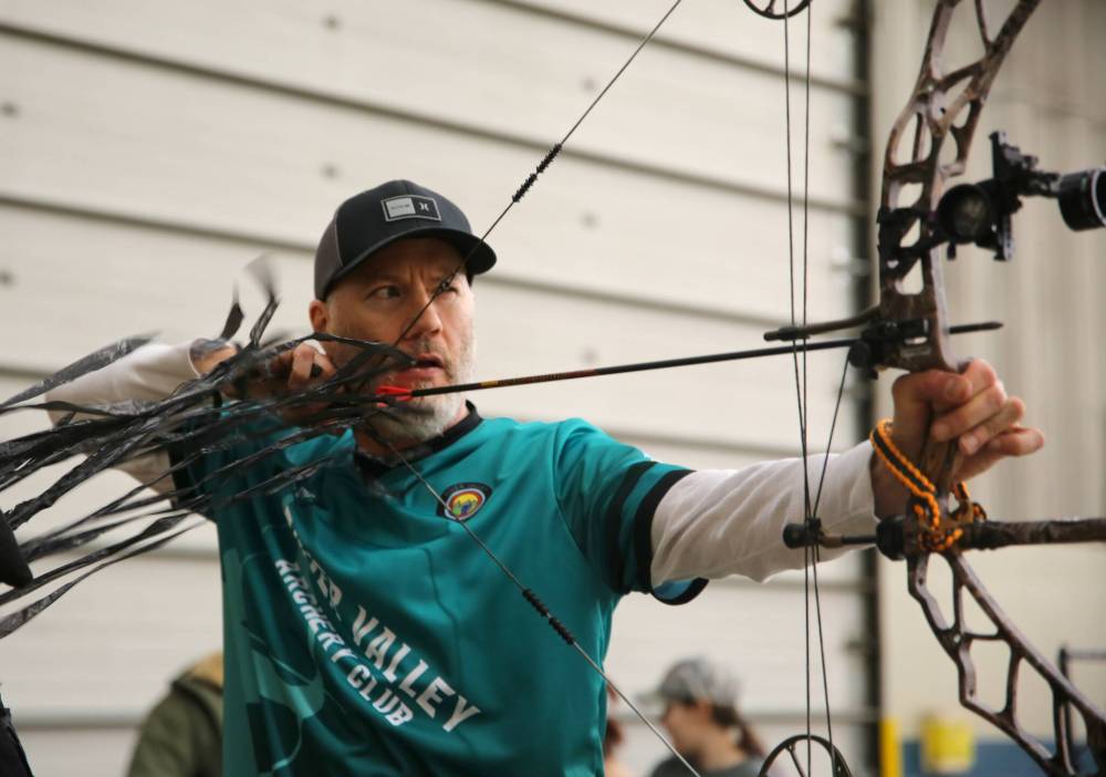 David Talbot from Veregin, Sask., takes aim during the Manitoba 3D Archery Challenge at the Keystone Centre on Sunday. (Michele McDougall/The Brandon Sun)