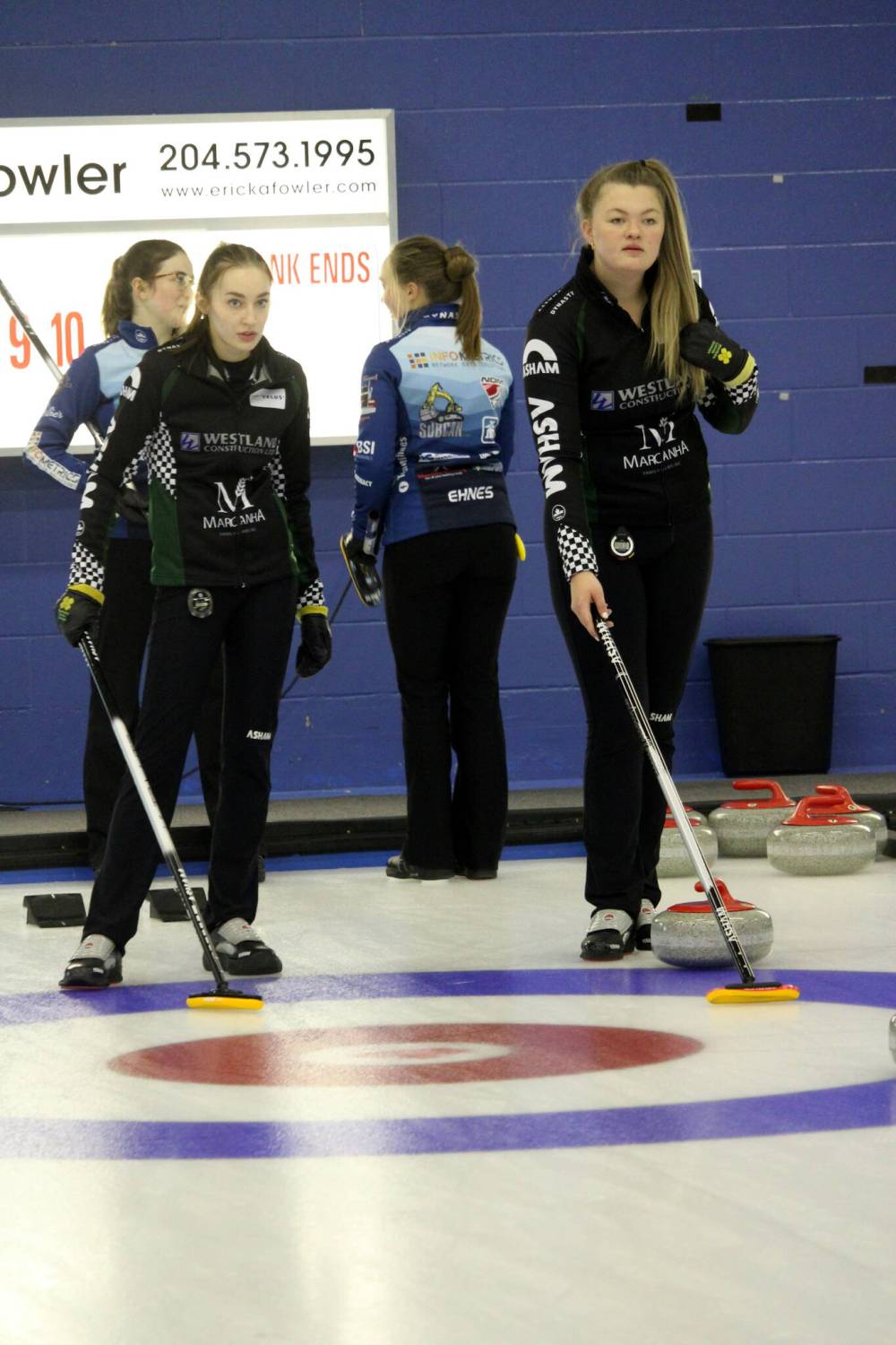 Dauphin's Makenna Hadway, left, and Katy Lukowich discuss a shot during the Sun Life Financial Junior Challenge at the Brandon Curling Club in November. Lukowich's rink finished up their run at 2023 Manitoba Scotties Tournament of Hearts in East St. Paul on Friday with a 2-3 record. (Lucas Punkari/The Brandon Sun)