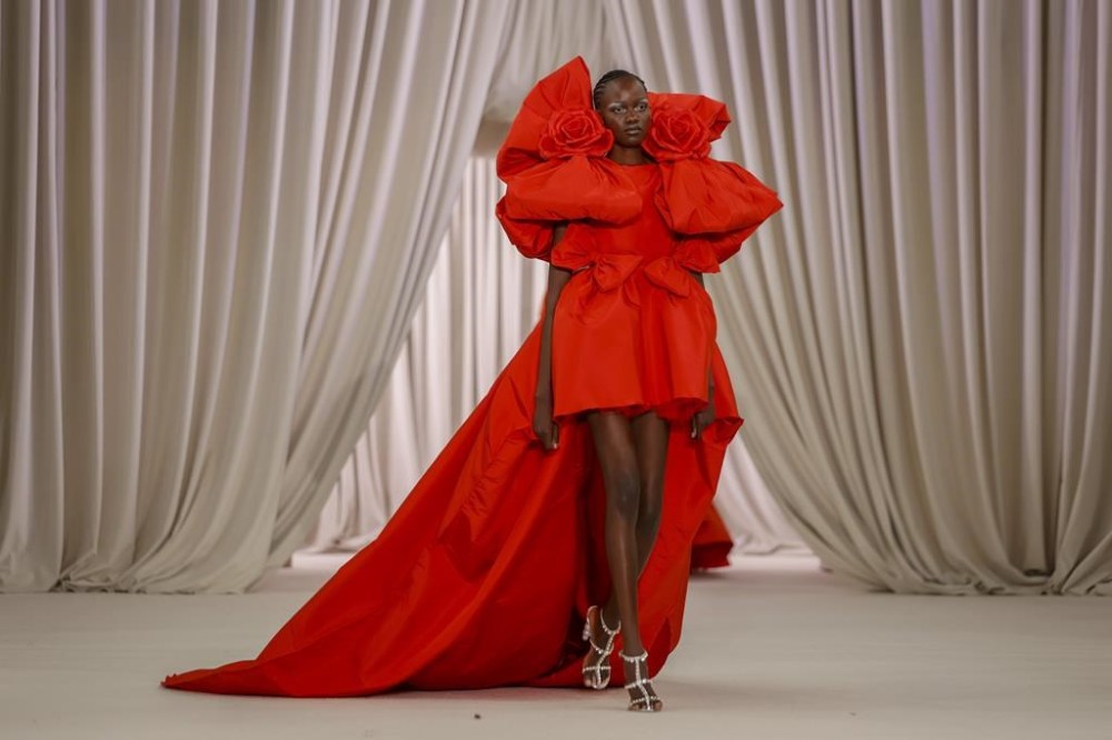 A model wears a creation as part of the Giambattista Valli Haute Couture Spring-Summer 2023 collection presented in Paris, Monday, Jan. 23, 2023. (AP Photo/Lewis Joly)