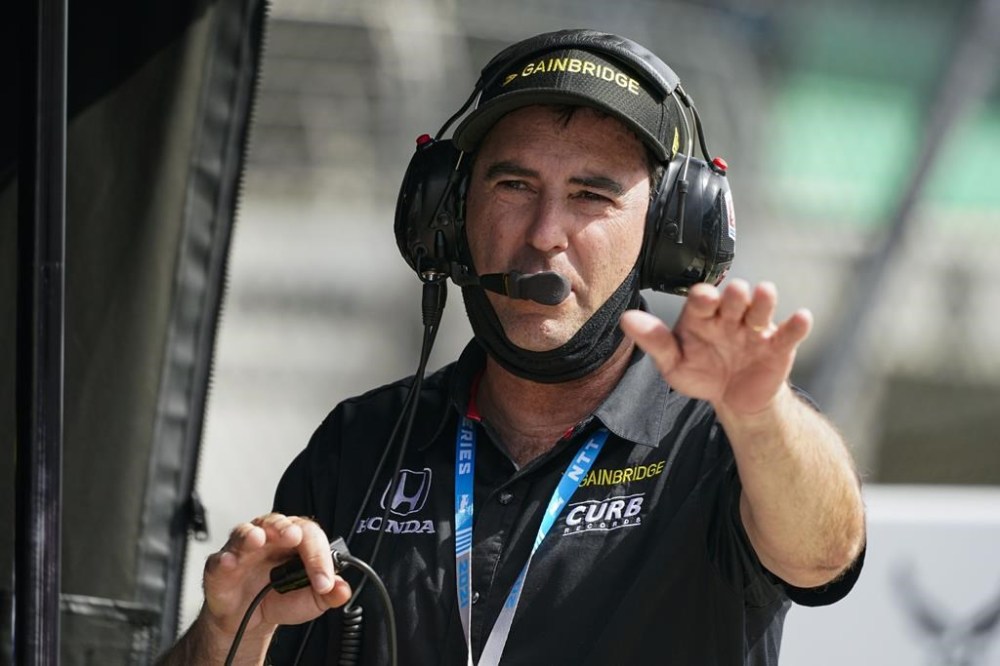 FILE - Car owner Bryan Herta in the pit area during practice for the Indianapolis 500 auto race at Indianapolis Motor Speedway in Indianapolis, Friday, May 21, 2021. Herta wants to enter Robert Wickens in the Indianapolis 500 as early as 2024. That's even a year longer than preferred because of the work required on the hand control system needed for the paralyzed driver. (AP Photo/Michael Conroy, File)