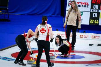 Team Canada skip Kerri Einarson directs her team as Team Ontario skip Rachel Homan watches on during the 2021 Scotties Tournament of Hearts final in Calgary. The two teams are expected to be the main contenders at this year's tournament in Kamloops, B.C. (The Canadian Press)
