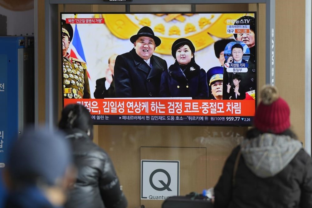 A TV screen shows an image of North Korean leader Kim Jong Un with his daughter during a news program at the Seoul Railway Station in Seoul, South Korea, Thursday, Feb. 9, 2023. Kim brought his young daughter to a huge military parade showing off the latest hardware of his fast-growing nuclear arsenal, including intercontinental ballistic missiles designed to reach the United States, state media said Thursday. (AP Photo/Lee Jin-man)