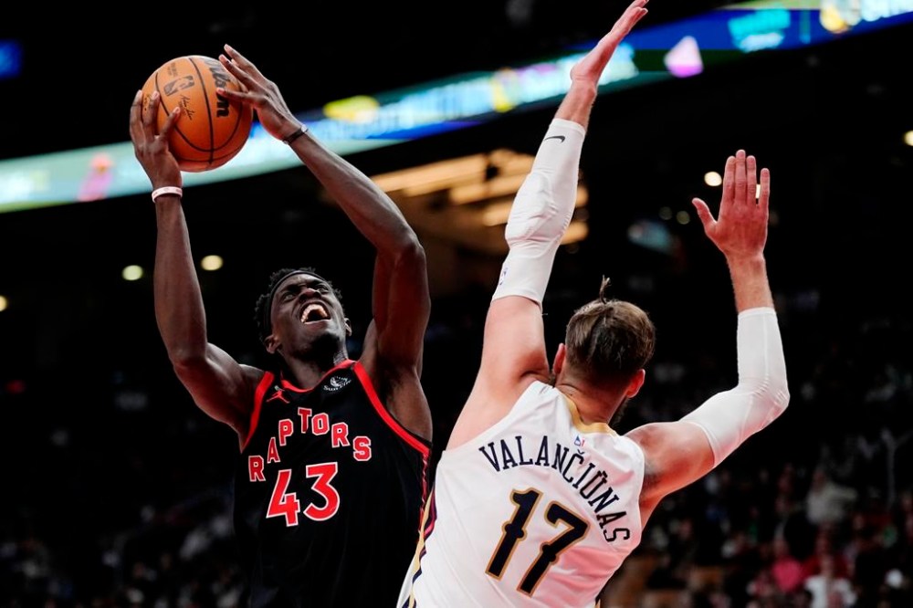 Toronto Raptors forward Pascal Siakam (43) shoots over New Orleans Pelicans centre Jonas Valanciunas (17) during second half NBA basketball action in Toronto on Thursday, February 23, 2023. THE CANADIAN PRESS/Frank Gunn