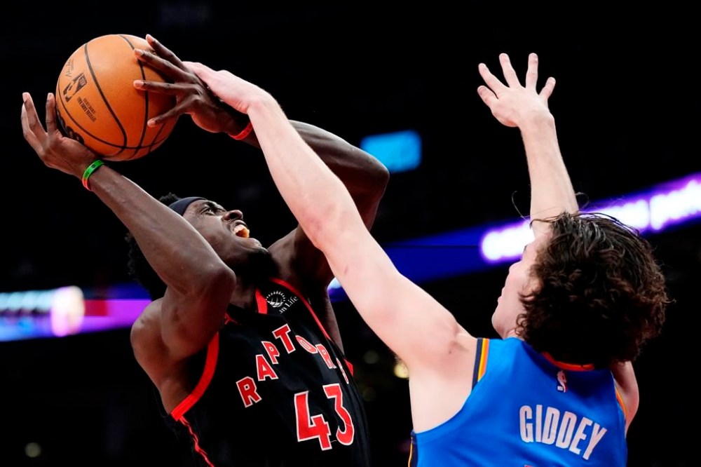 Toronto Raptors forward Pascal Siakam (43) is fouled by Oklahoma City Thunder guard Josh Giddey (3) during first half NBA basketball action in Toronto on Thursday, March 16, 2023. THE CANADIAN PRESS/Frank Gunn