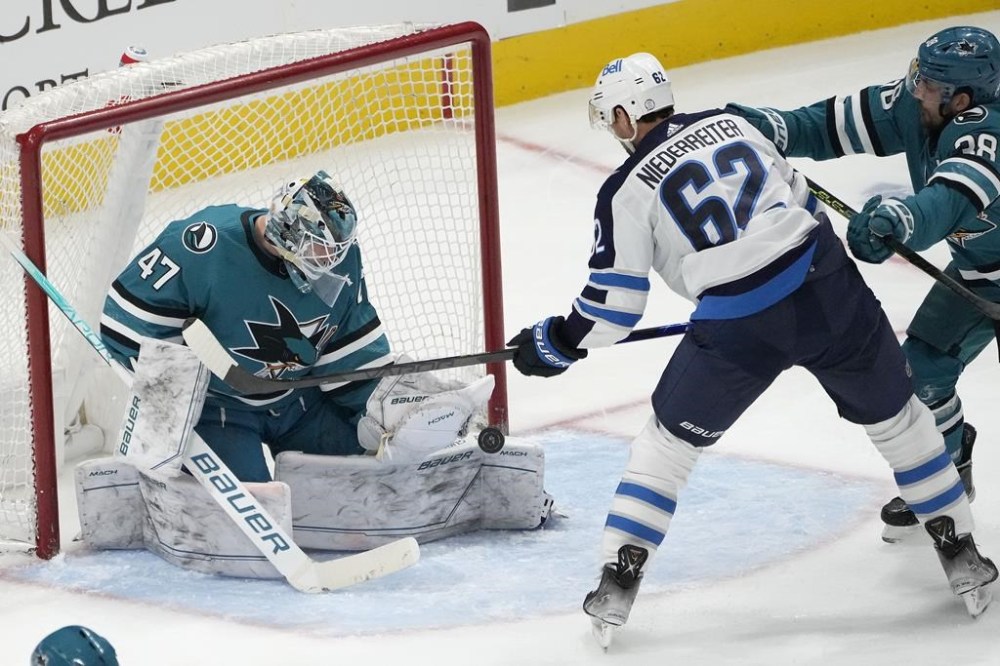 When Rick Bowness criticized some players this week for lack of effort, veteran forward Nino Niederreiter agreed there have been “passengers” on the struggling team’s ride to the playoffs. San Jose Sharks goaltender James Reimer (47) blocks a shot by Niederreiter (62) during the third period of an NHL hockey game March 28, 2023, in San Jose, Calif. THE CANADIAN PRESS/AP-Tony Avelar