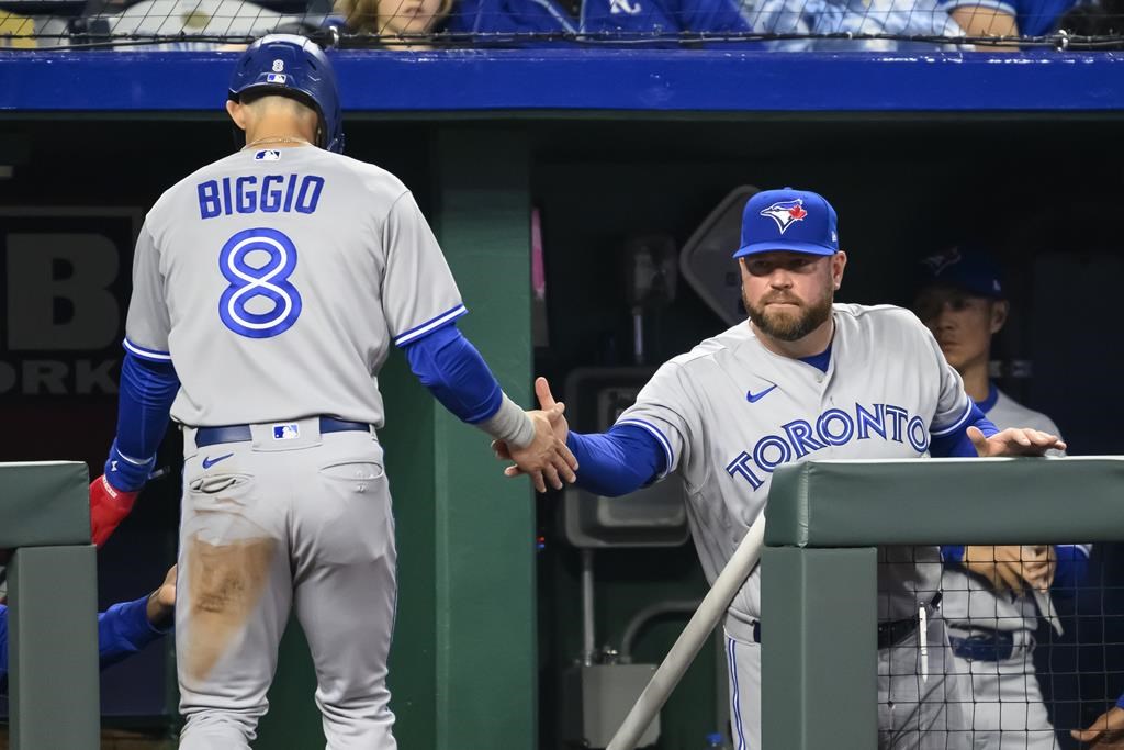 Singer Lopez lead Royals past Blue Jays 95 for 1st win