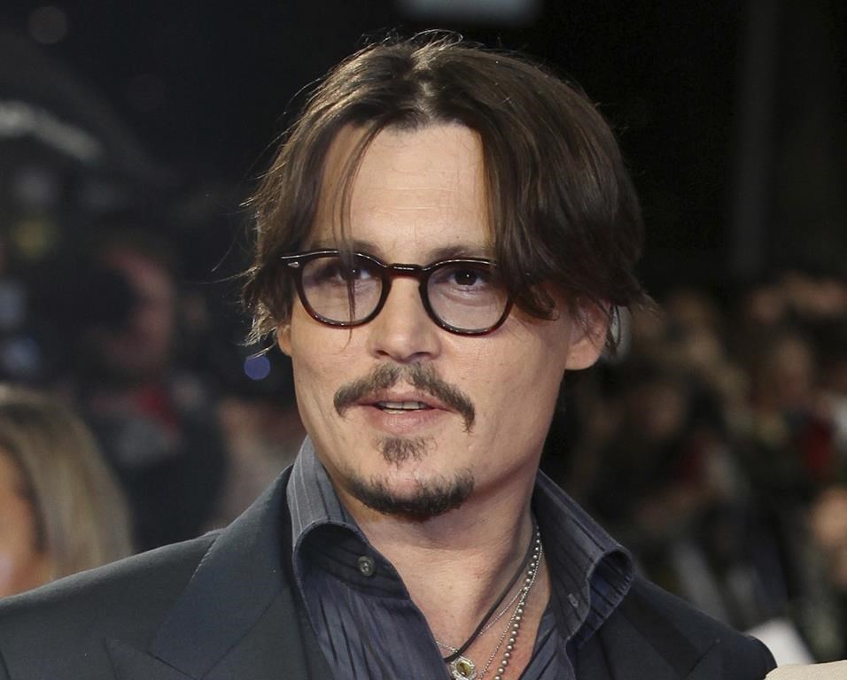 FILE - Actor Johnny Depp appears for the European premiere of their film,