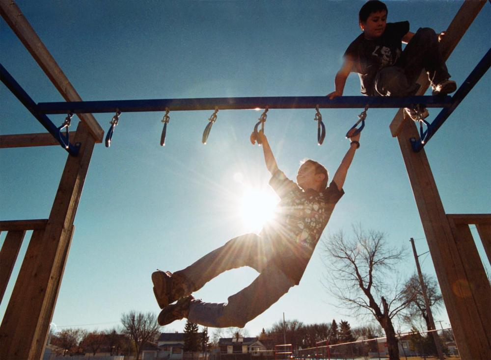 Boys play at a playground in Brandon in this file image. Columnist Anahita Shadkam describes how society has fallen into