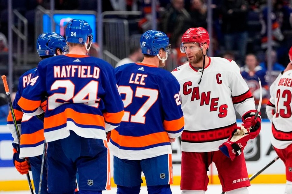 Carolina Hurricanes' Jordan Staal (11) shakes hands with New York Islanders' Anders Lee (27) after Game 6 of an NHL hockey Stanley Cup first-round playoff series Friday, April 28, 2023, in Elmont, N.Y. The Hurricanes won 2-1, taking the series. (AP Photo/Frank Franklin II)