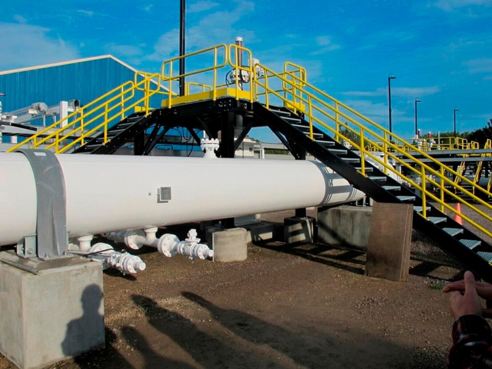 Enbridge Inc. says it has reached a deal with shippers for tolling on its Mainline pipeline system, which moves over three million barrels a day of crude oil and liquids from Western Canada. This photo taken in October 2016 shows an aboveground section of Enbridge's Line 5 at the Mackinaw City, Mich., pump station. THE CANADIAN PRESS/AP-John Flesher