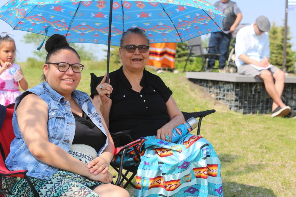 Marisa and Debra Tacan wait for the Our Journey, Indigenous Student Graduation Celebration at the Riverbank Discovery Centre in Brandon on Wednesday. (Michele McDougall, The Brandon Sun)