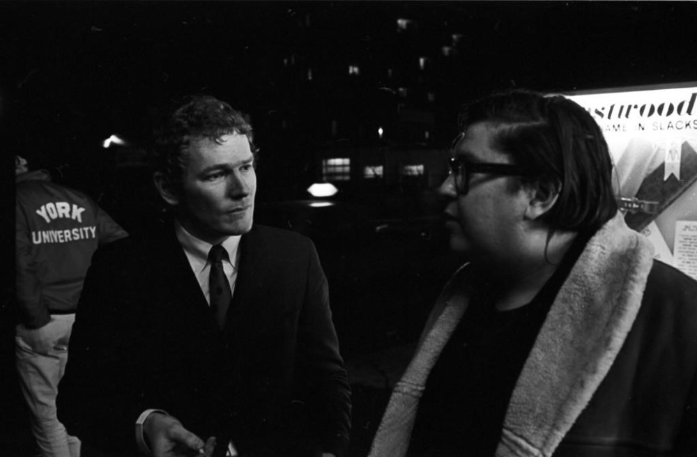 Gordon Lightfoot, left, talks with artist Robert Markle at the Riverboat in the Yorkville neighbourhood of Toronto on January 3, 1967 in this handout photo. THE CANADIAN PRESS/HO - York University Libraries, ASC00609 **MANDATORY CREDIT**