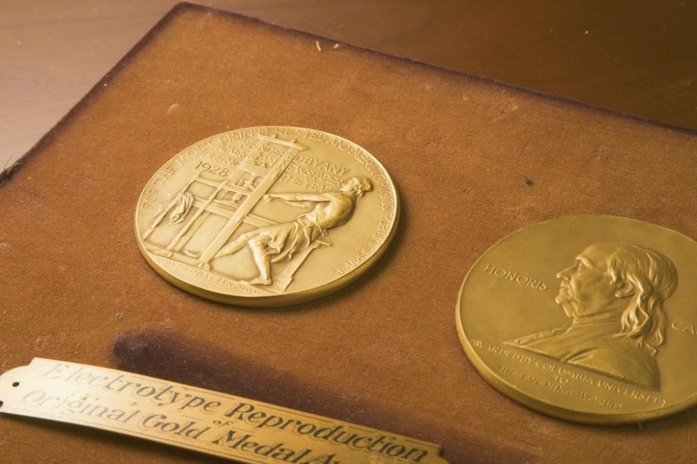 FILE - This undated photo shows the front and back sides of the medal awarded for the Pulitzer Prizes in New York. The Pulitzer Prizes recognizing the best of journalism and the arts in 2022 were announced Monday. (The Pulitzer Prizes via AP)