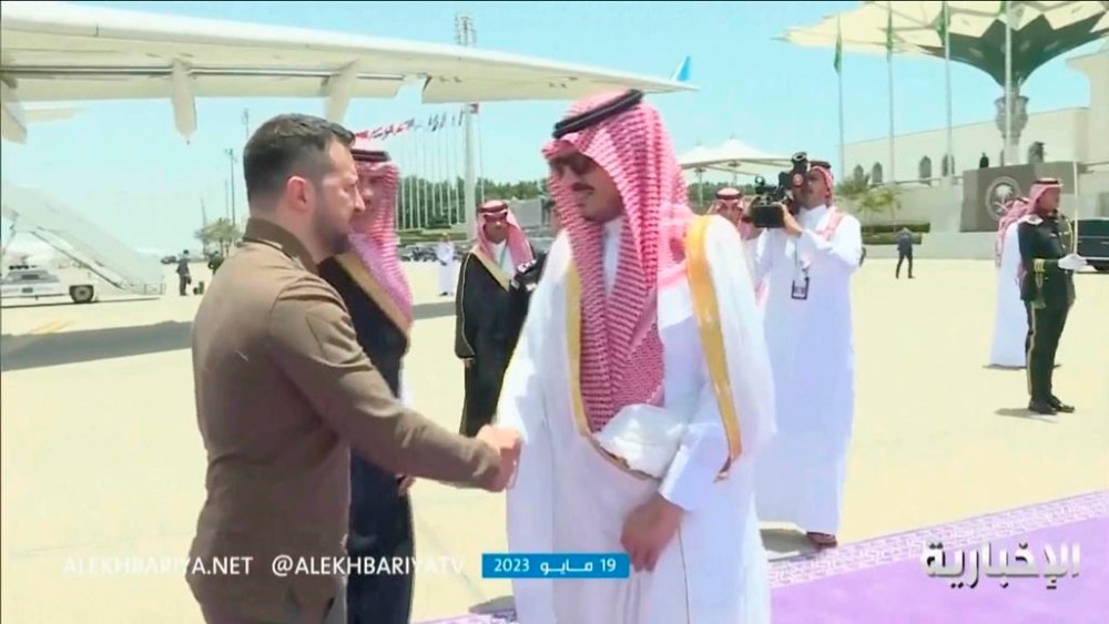 This video grab shows Ukrainian President Volodymyr Zelenskyy, left, arriving at the airport in Jeddah, Saudi Arabia, Friday May 19, 2023. Zelenskyy announced Friday he has kicked off a visit to Saudi Arabia, aiming to “enhance bilateral relations and Ukraine’s ties with the Arab world.” (Saudi state TV: Al Ekhbariya via AP)