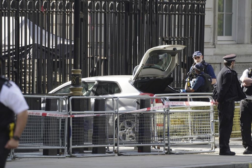Man arrested after car collides with gates of Downing Street; police ...
