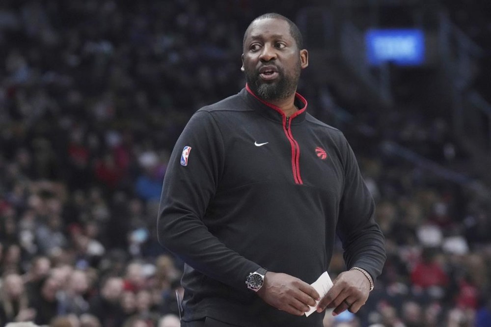 FILE -Toronto Raptors assistant coach Adrian Griffin takes charge of the team against the Detroit Pistons in NBA basketball game action in Toronto, Sunday, Feb. 12, 2023. The Milwaukee Bucks are finalizing a deal to make Adrian Griffin their head coach after he spent the last five seasons as a Toronto Raptors assistant, a person familiar with the situation tells The Associated Press, Saturday, May 27, 2023.(Chris Young/The Canadian Press via AP, File)