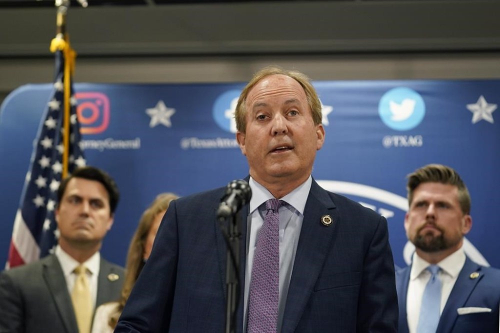 Texas state Attorney General Ken Paxton reads a statement at his office in Austin, Texas, Friday, May 26, 2023. An investigating committee says the Texas House of Representatives will vote Saturday on whether to impeach state Attorney General Ken Paxton. (AP Photo/Eric Gay)