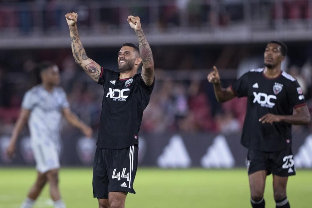D.C. United midfielder Victor Pálsson (44) and Donovan Pines (23) celebrate a goal by Theodore Ku-DiPietro against CF Montréal during the second half of an MLS soccer match in Washington, Wednesday, May 31, 2023. (AP Photo/Manuel Balce Ceneta)