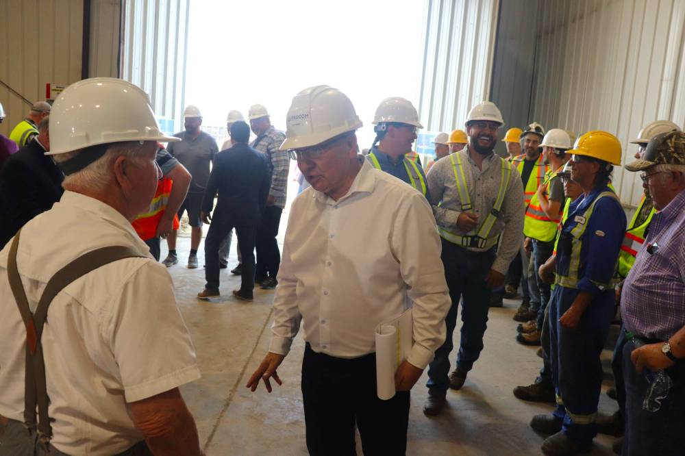 Potash and Agri Development Corporation of Manitoba president Daymon Guillas speaks with government officials and members of the public on June 9, 2023 after welcoming them to the province's first potash mining facility. PADCOM has agreed to pay money to the Manitoba Métis Federation as it operates the mine near Russell. (File)