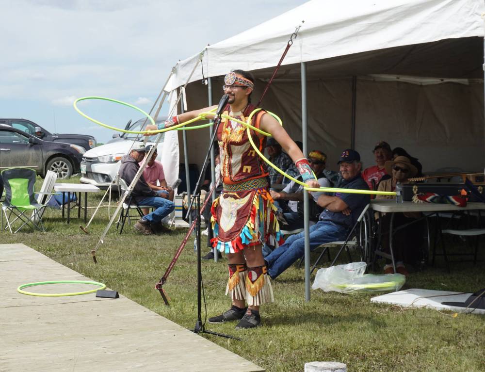 Dallas Arcand Jr. told traditional stories and demonstrated hoop dancing at the Rolling River First Nation Powwow on Wednesday. (Miranda Leybourne/The Brandon Sun)