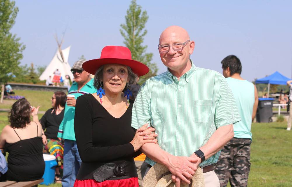 Brandon University chancellor Mary Jane McCallum and school president David Docherty wait for the “Our Journey, Indigenous Student Graduation Celebration
