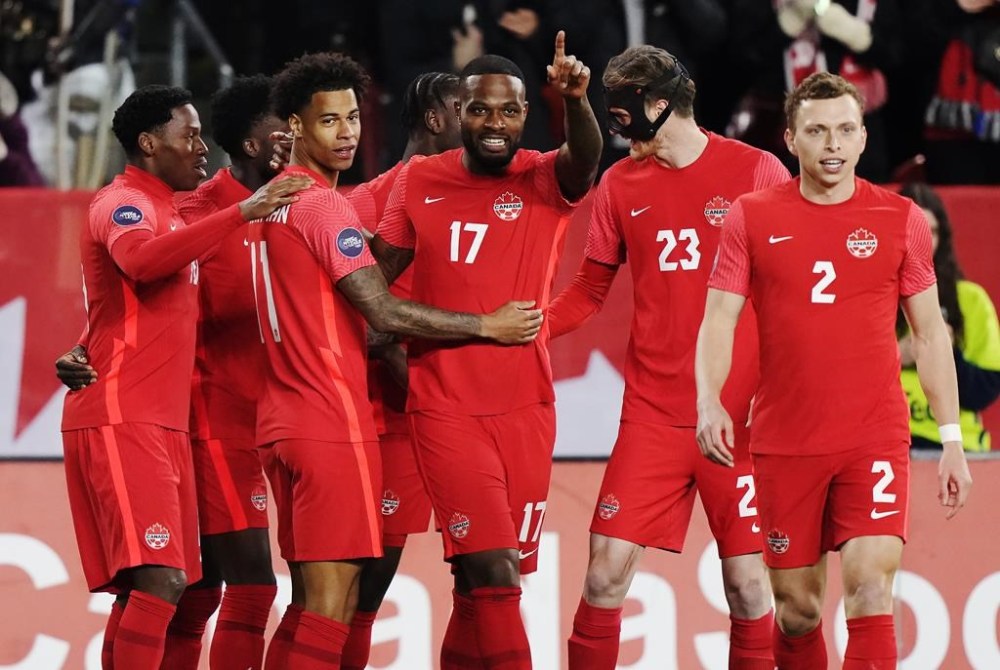 Canada forward Cyle Larin (17) celebrates his goal against Honduras with teammates during first half CONCACAF Nations League soccer action in Toronto on Tuesday, March 28, 2023. The 47th-ranked Canadian men moved within one win of their first trophy in 23 years with a 2-0 win over Panama in CONCACAF Nations League semifinal play Thursday. THE CANADIAN PRESS/Nathan Denette