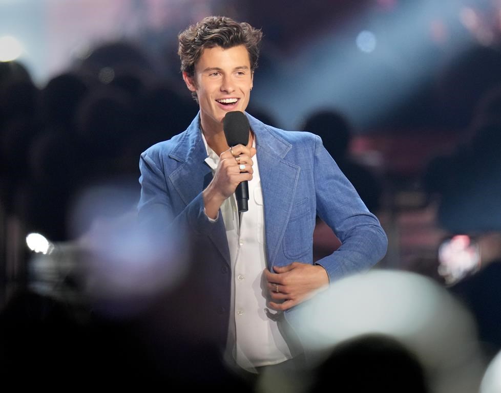 Shawn Mendes is awarded the International Achievement Award during the Juno Awards in Toronto on Sunday, May 15, 2022. British singer-songwriter Ed Sheeran gave his Canadian fans a homegrown surprise on Saturday when Shawn Mendes joined him on stage for the first of two shows in Toronto. THE CANADIAN PRESS/Nathan Denette